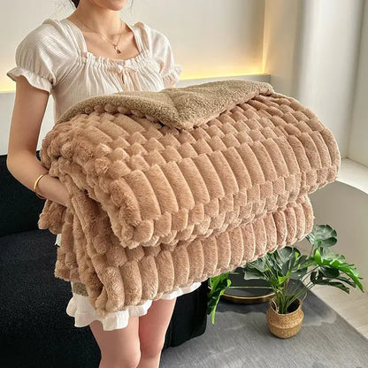 A tan double layer lamb plush throw blanket with textured ribbed fleece offers soft and cozy warmth