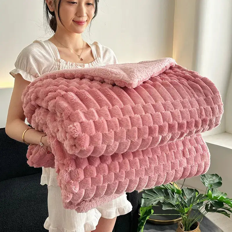 Pink double layer lamb plush throw blanket with textured quilted pattern and soft fleece surface for bedroom use