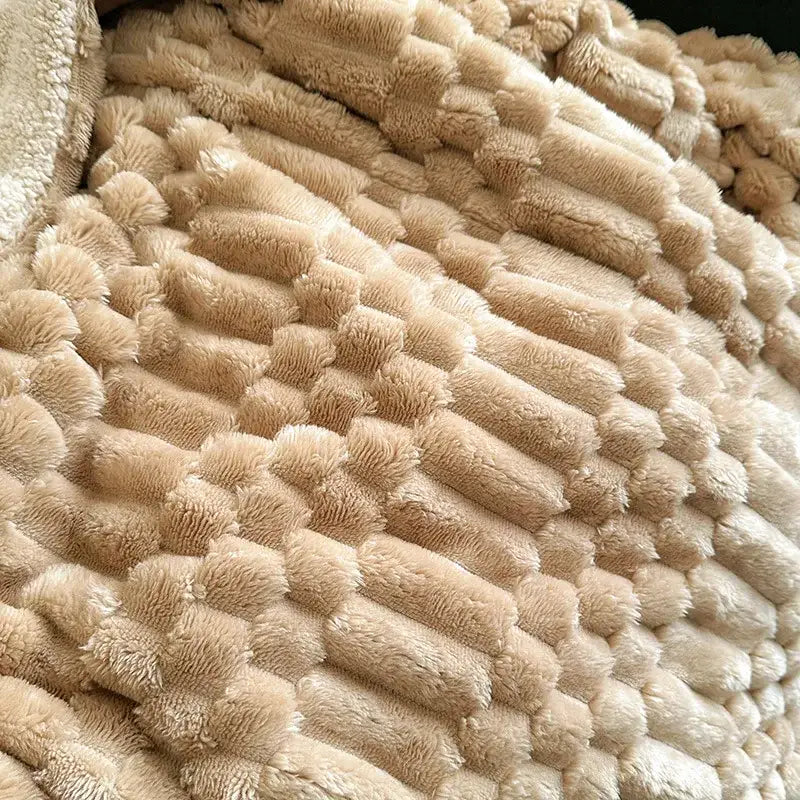 Beige double layer lamb plush throw blanket with soft fuzzy surface and raised corduroy-like ridges for bedroom use