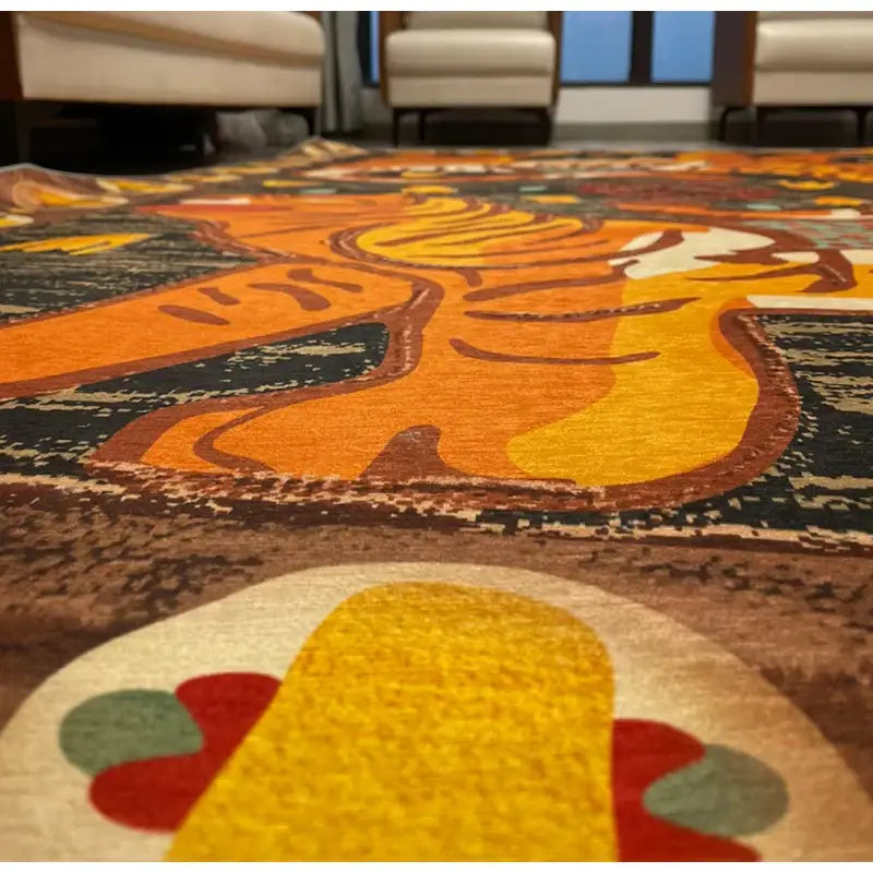 Vibrant orange and yellow double tiger bohemian moroccan rug with bold stylized design for living room decor