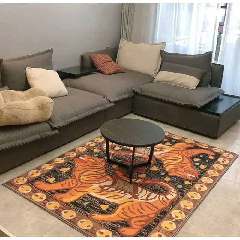 A vibrant orange double tiger bohemian moroccan rug with dark brown border and yellow motifs for living room decor