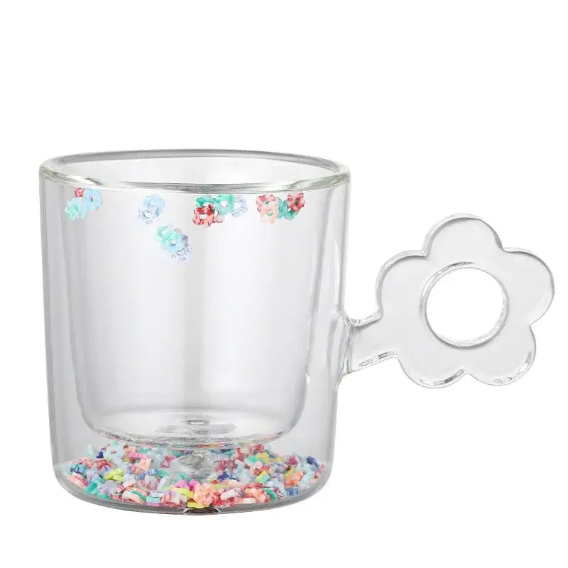 Clear double wall glass mug with colorful glitter flowers and a flower-shaped handle for kitchen and dining room use