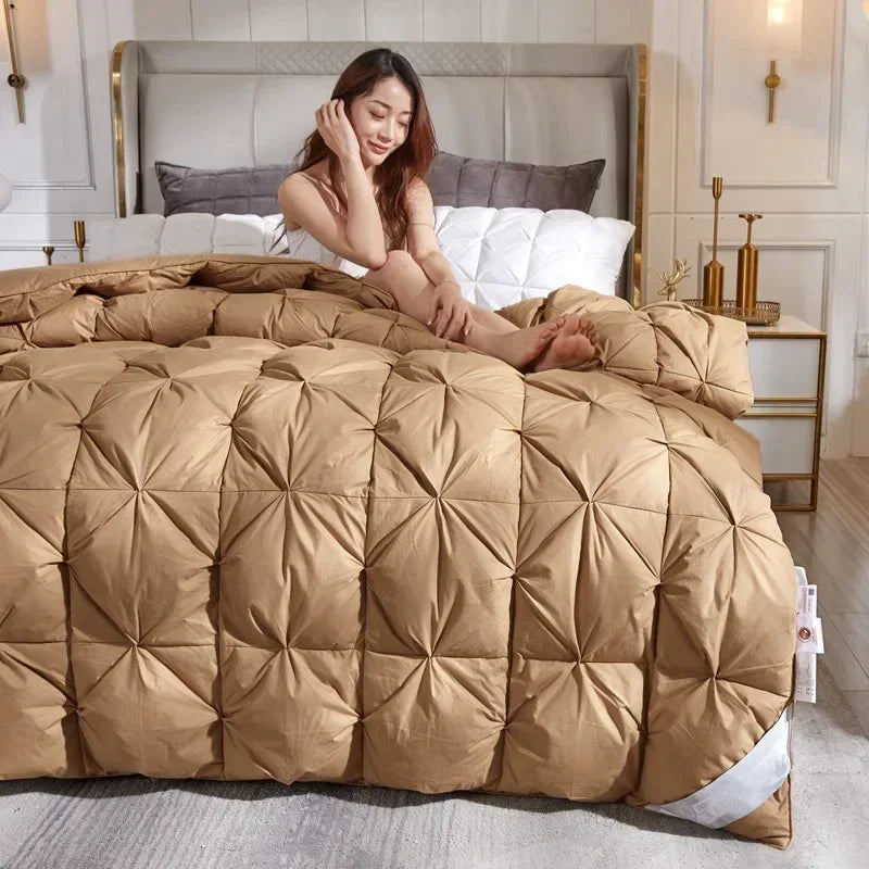 A plush tan down duvet with diamond quilted pattern filled with 95 white goose down for warm hotel use