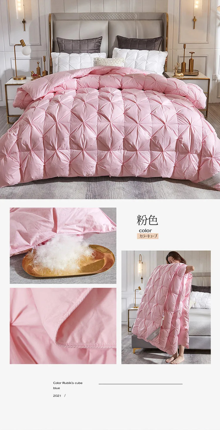 Pink quilted down duvet with plush white 95 percent goose down filling and soft satin-like fabric for warm comfort