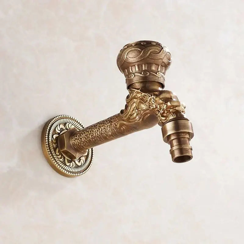Antique bronze outdoor faucet with decorbites dragon carved design and ornate wall plate for bathroom or garden use
