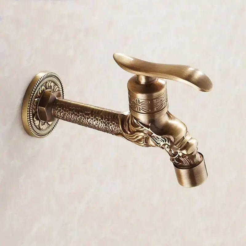 Antique bronze bathroom faucet with decorbites dragon carved design and embossed detailing on spout and handle