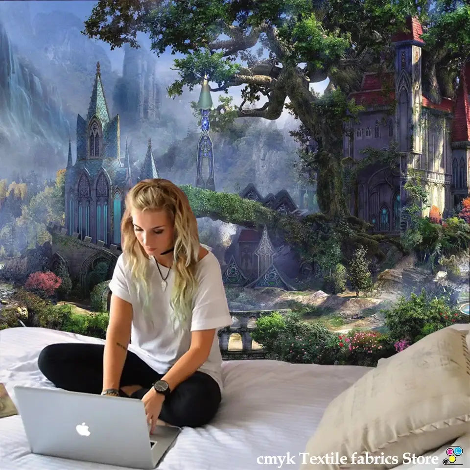 Silver apple laptop placed on a dreamy castle mushroom tapestry hippie wall hanging decor in bedroom setting