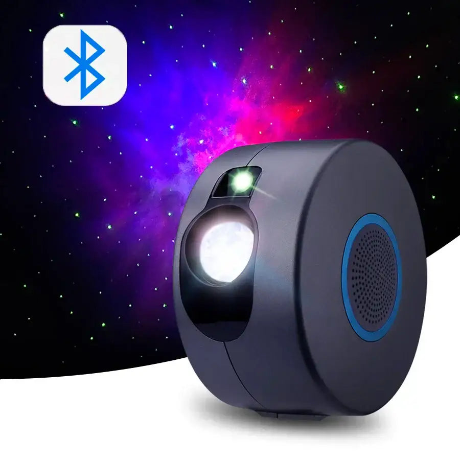Black cylindrical bluetooth dynamic galaxy star projector light with blue accent ring emitting bright white light for bedroom decor