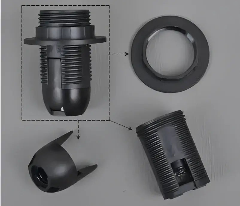 Black plastic e27 lamp bulb holder fitting with threaded metal insert and flanged base for living room use