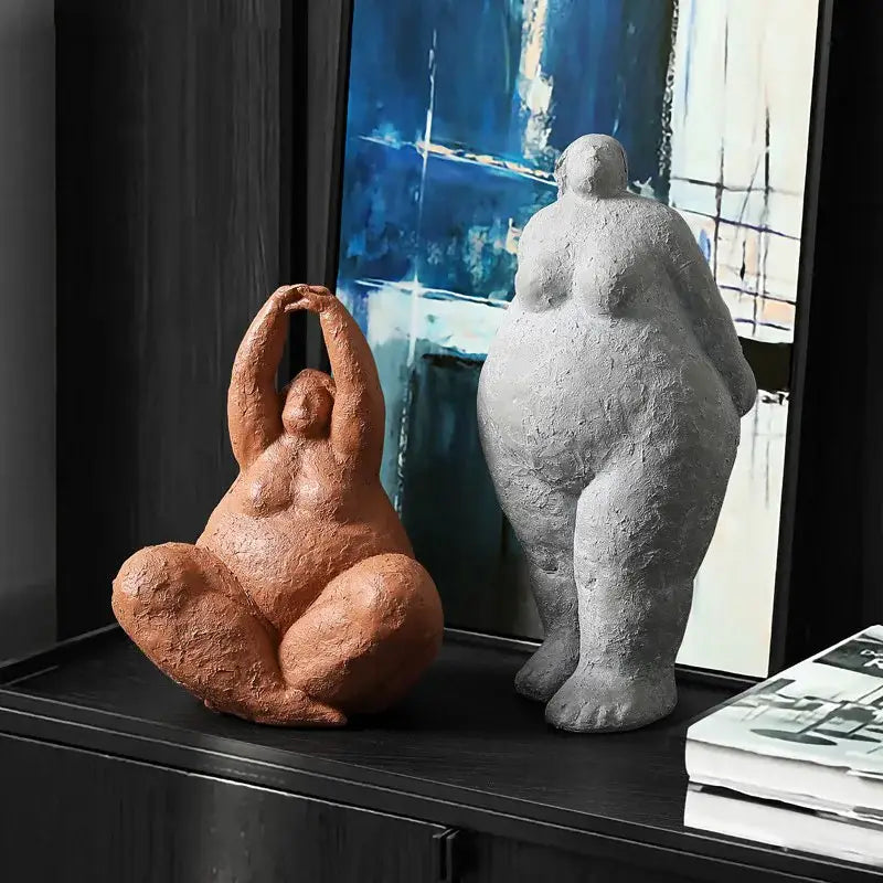 Two earthy terracotta and gray textured clay yoga women figure set featuring curvy dreaming yoga women for decorbites decor