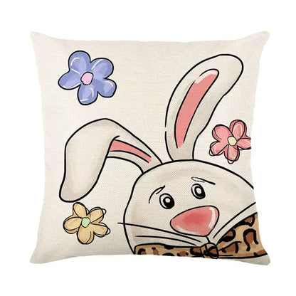 Beige linen cushion cover featuring an easter bunny rabbit with pink ears and embroidered floral accents