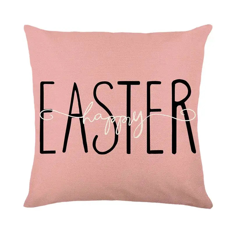 Pink linen cushion cover with easter bunny rabbit design featuring bold black easter text and white happy script