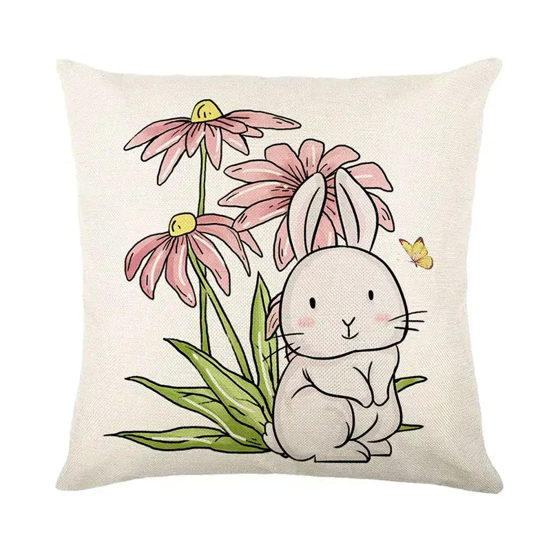 Cream-colored bunny rabbit linen cushion cover with easter bunny rabbit design and pink coneflowers for living room decor