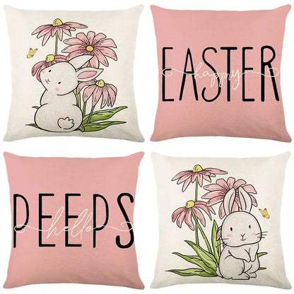 Set of four easter bunny rabbit linen cushion covers with cute bunnies pink flowers and black lettering on pastel backgrounds