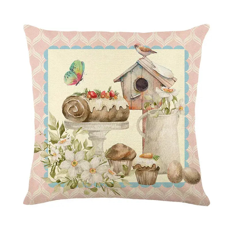 Pastel pink and blue bunny rabbit linen cushion cover with watercolor Easter baked goods and floral design for living room