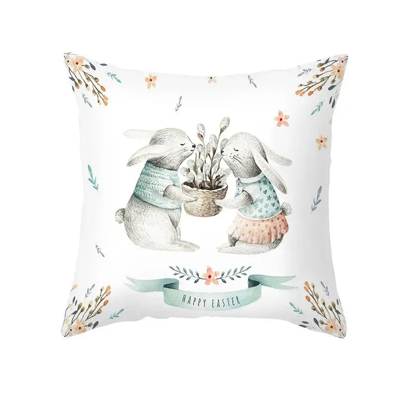 White cushion easter rabbit and eggs pillowcase with pastel rabbit illustration and floral home decor accents