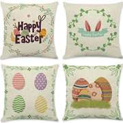 Set of four cream-colored cotton eggs linen pillowcases with colorful easter rabbit eggs and green leafy borders for living room decor