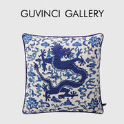 Square velvet pillow cover with indigo blue embroidered dragon and floral motifs on cream background decorbites indigo blue