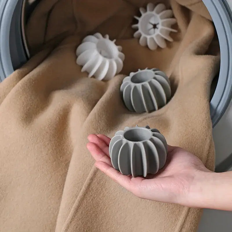 Gray ribbed silicone laundry detergent pods in a 10-piece eco-friendly laundry washing starburst balls set