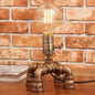 Édith - Bronze Warehouse Style Iron Table Light: Single-Bulb Robot Nightstand