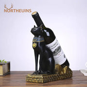 Egyptian black resin cat god wine rack with gold and blue collar holding wine bottle for dining room decor