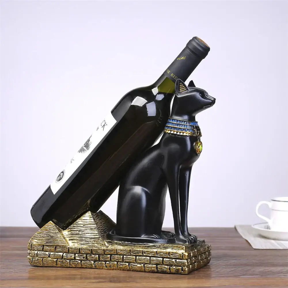 Black resin egyptian cat figurine with gold and blue beaded collar holding a wine bottle wine bottle holder decor