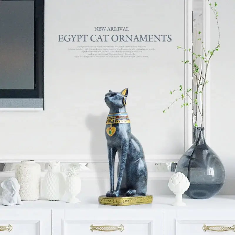 Dark blue egyptian cat resin figurine with gold trim and hieroglyphic detailing for elegant home decor