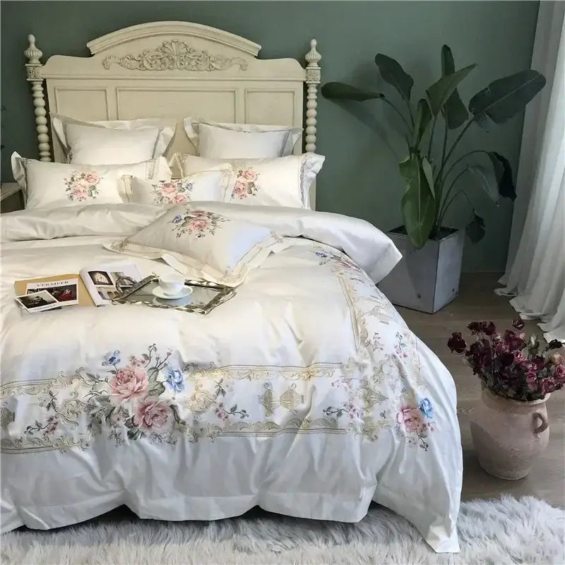 White floral embroidered egyptian cotton white bedding set with delicate pink and blue roses on satin-like fabric