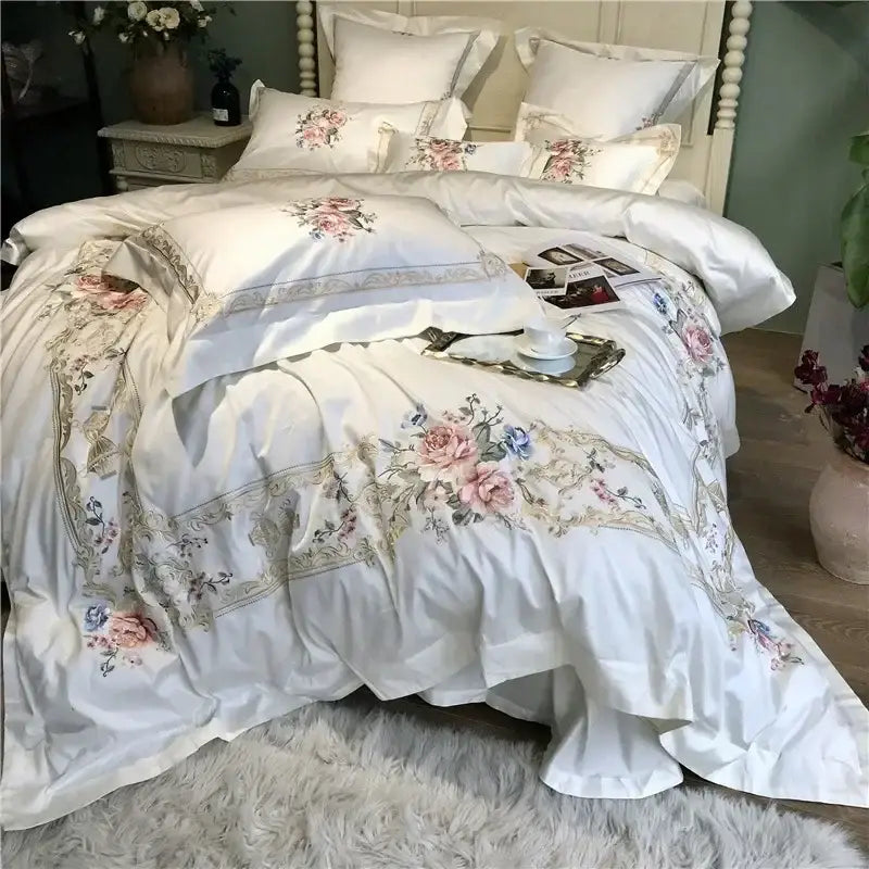 White satin egyptian cotton white embroidery bedding set with pink and blue floral embroidery and gold-toned borders