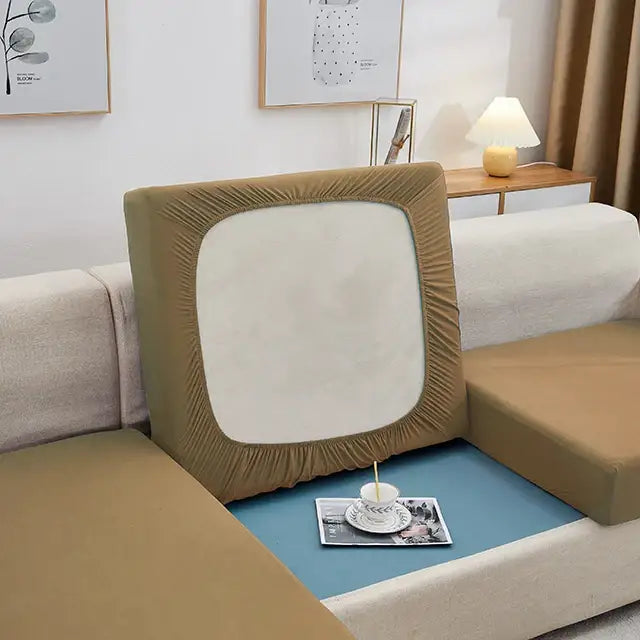 Tan elastic fabric sofa cushion cover with white central panel and ruched edges for living room protector