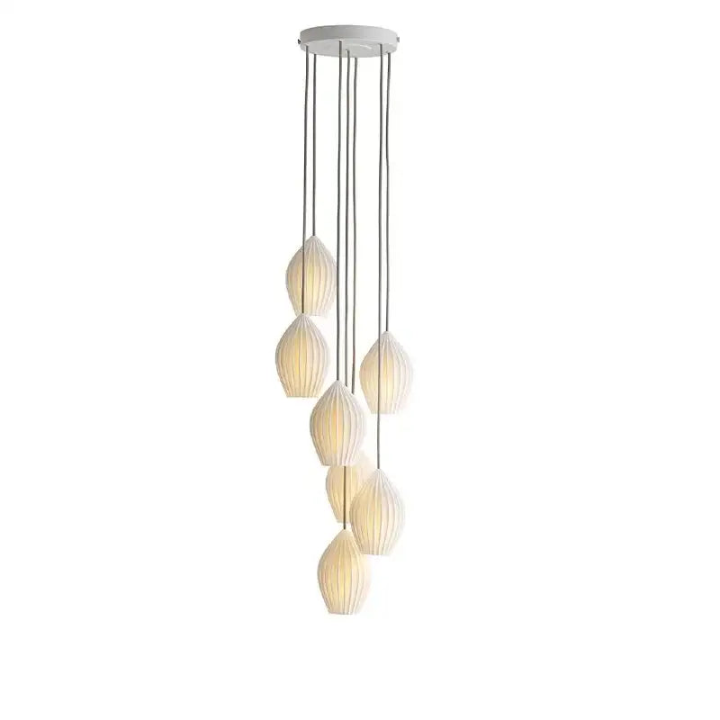 Modern white pendant lights with seven ribbed ceramic teardrop shades in gold for elegance ribbed ceramic pendant lighting