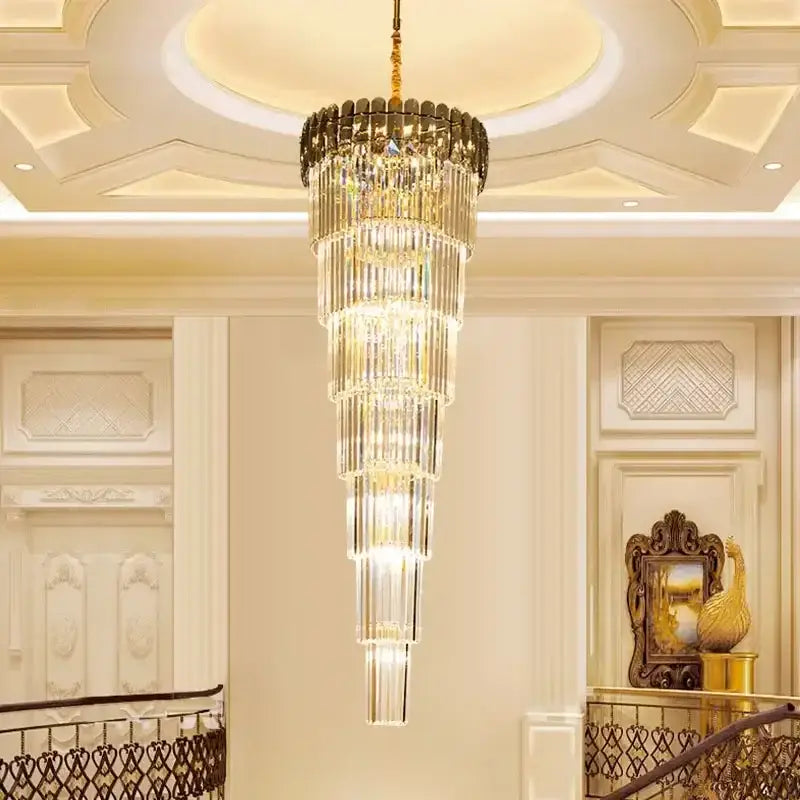 An elegant amber and clear crystal led pendant chandelier with gold-toned metal accents for dining room decorbites crystal led