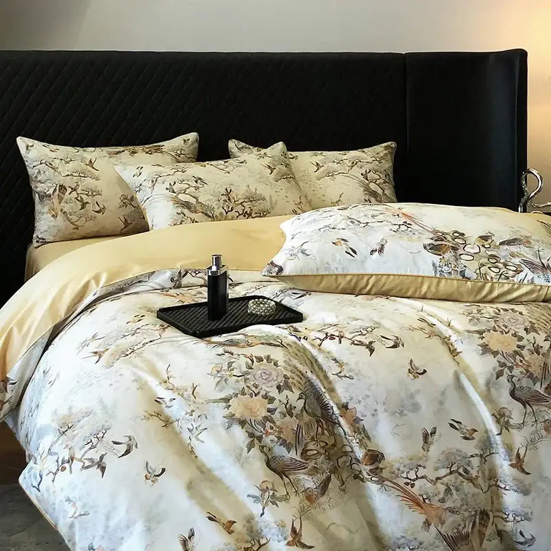 Elegant cream satin bedding set with intricate bird and floral patterns in colorful egyptian cotton by decorbites