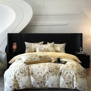 Elegant cream-colored satin bedding set with bird and floral pattern on black bed featuring decorbites colorful egyptian cotton