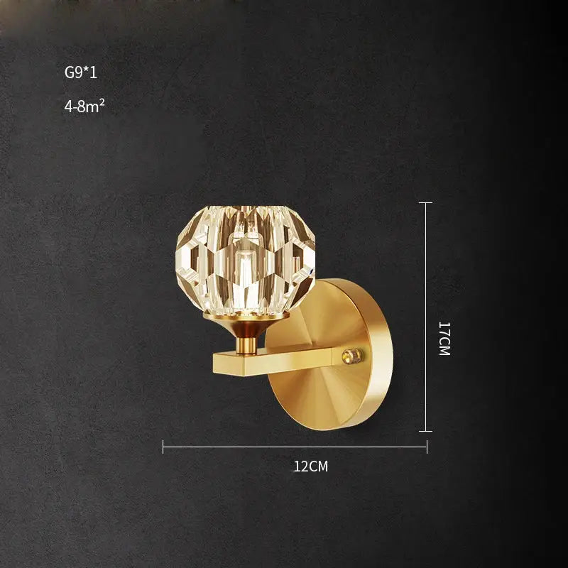 Gold-finished wall sconce with faceted crystal globe for elegant black and gold decorbites crystal stone wall lamp