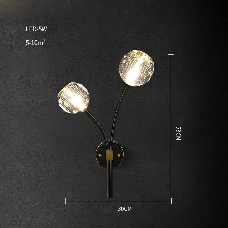 Elegant black and gold wall sconce with two crystal globe shades and decorbites crystal stone wall lamp base