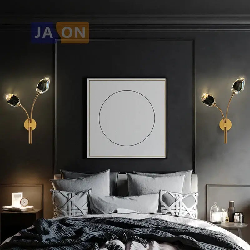 Elegant black and gold wall sconce with faceted crystal stone accents perfect as a decorbites wall lamp for bedrooms