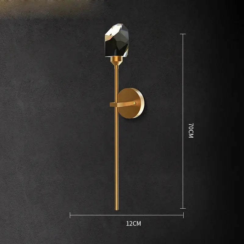 Elegant black and gold decorbites crystal stone wall sconce with faceted black crystal accent for bedroom lighting