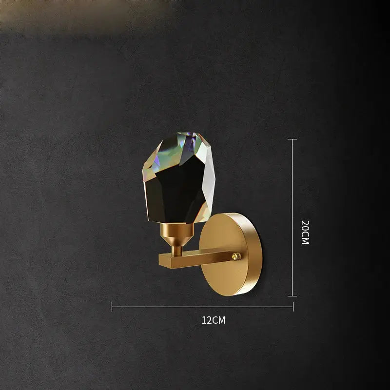 Elegant black and gold crystal stone wall sconce with gold-toned fixture and faceted black crystal bulb by decorbites wall lamp