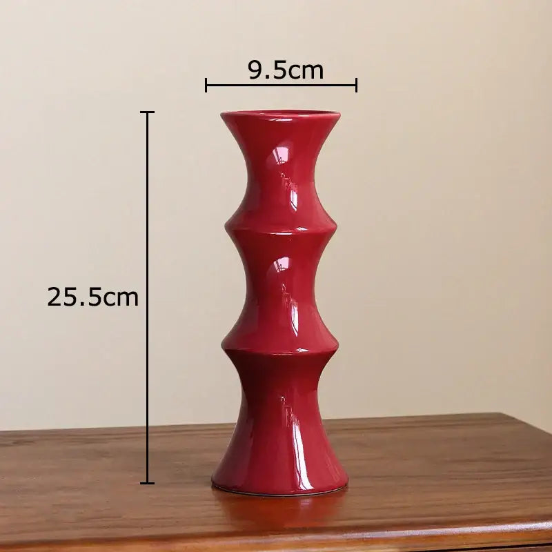 Glossy red bamboo shape ceramic vase with segmented hourglass design for elegant living room decorbites decor