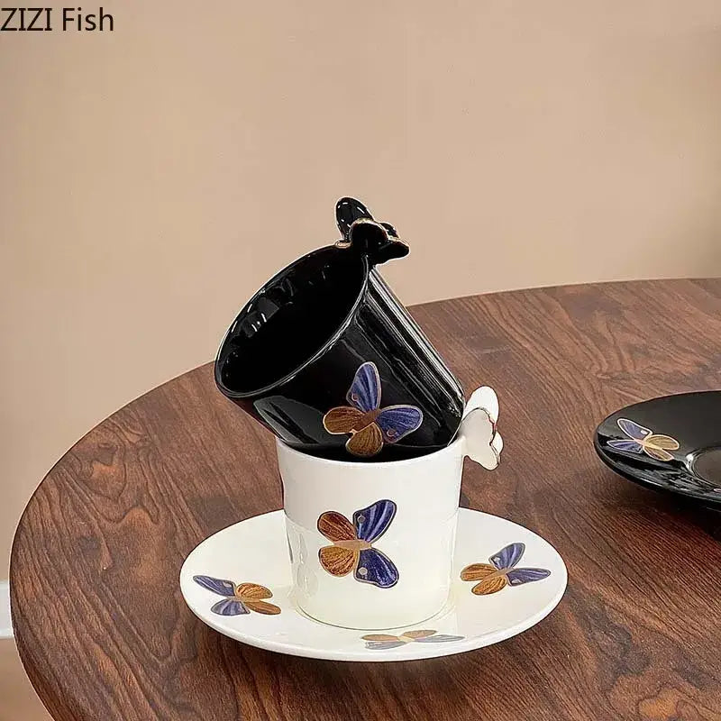 Elegant white ceramic tea cup with blue and gold butterfly decals and matching saucer for dining room use