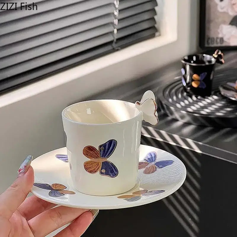 Elegant black butterfly ceramic tea cup and saucer set featuring white ceramic tea cup with butterfly handle and painted butterflies