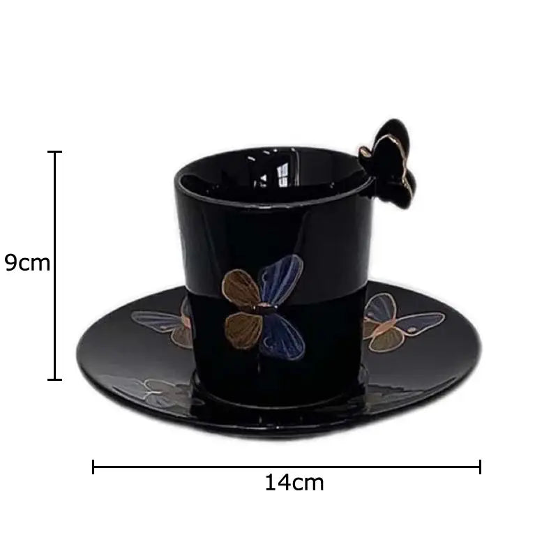 Elegant black ceramic tea cup and saucer set featuring a butterfly design and decorative butterfly handle for dining room use
