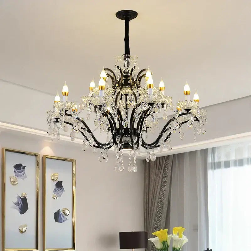 Elegant black crystal candle chandelier lighting with ornate wrought iron arms and clear crystal droplets for dining room decorbites crystal candle