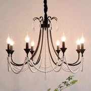 Elegant black crystal chandelier pendant light with white pearl strands and crystal droplets for living room decor