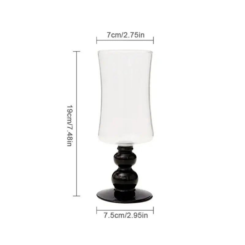 Elegant black goblet glass coffee cup set with clear glass candle holder featuring a sleek black base and three rounded tiers