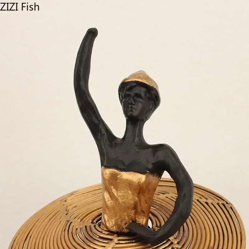 Elegant black and gold ballerina sculpture with golden hat and torso accent for bedroom marble decor