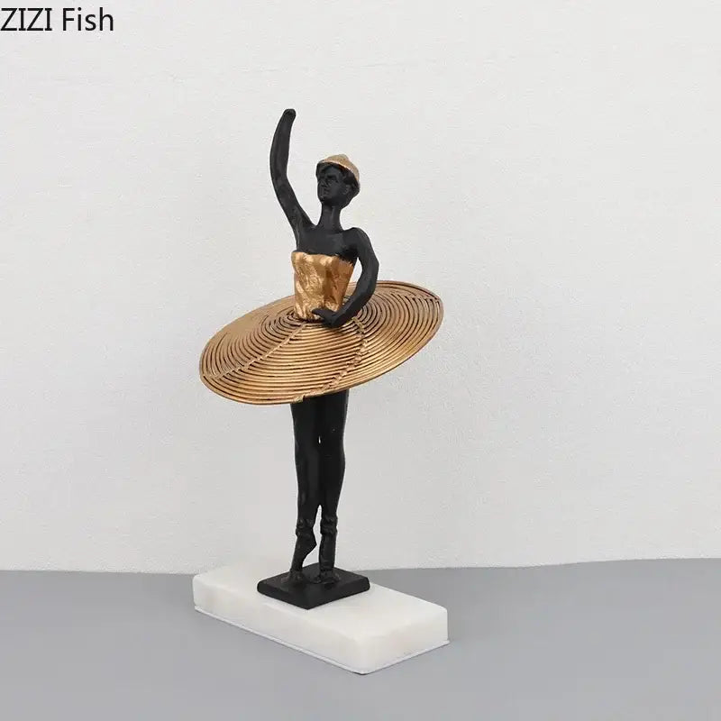 Elegant black and gold ballerina sculpture with woven golden tutu on white marble base for bedroom decor