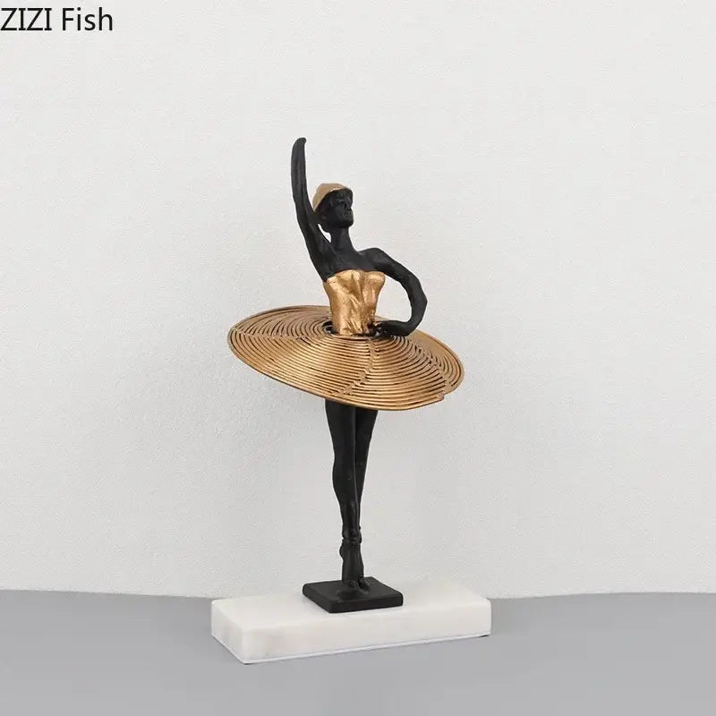 Elegant black and gold ballerina sculpture with textured circular skirt on white marble base for bedroom decor