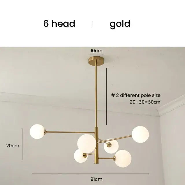 Elegant black gold glass ball chandelier with six spherical frosted glass lights in a geometric living room design